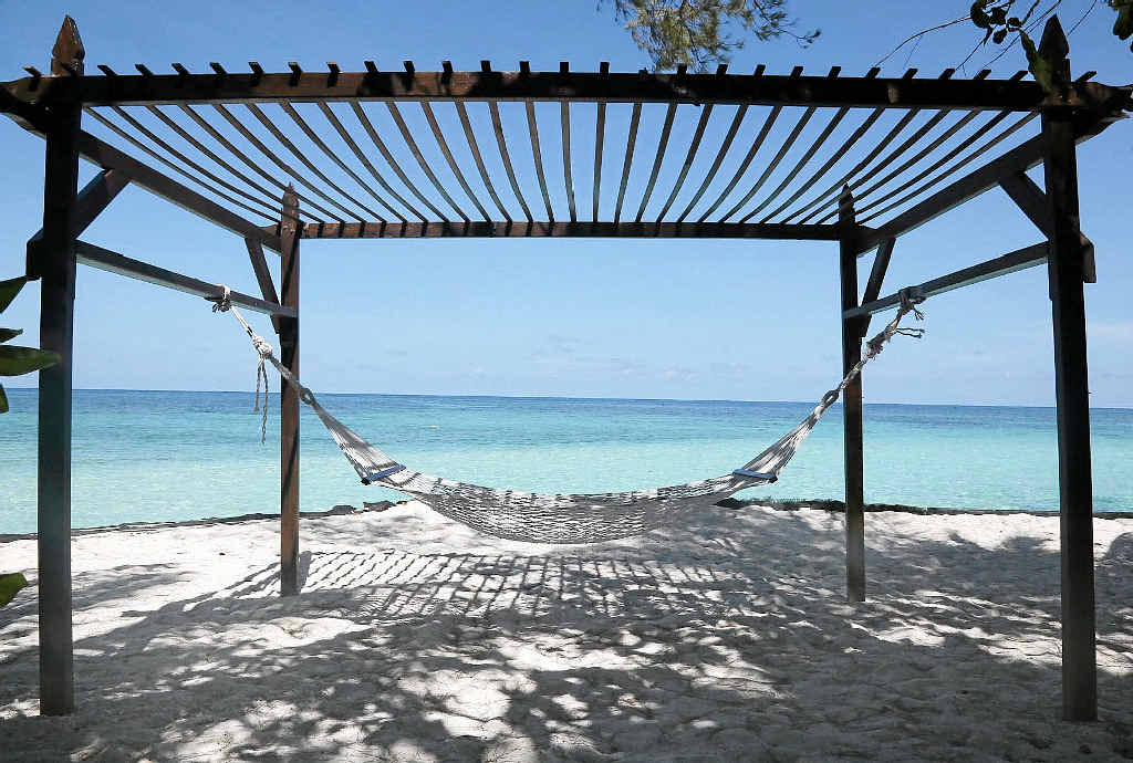PARADISE: Hammocks are everywhere, letting you take advantage of the views on Lankayan island off Sandakan, Sabah, Malaysia.